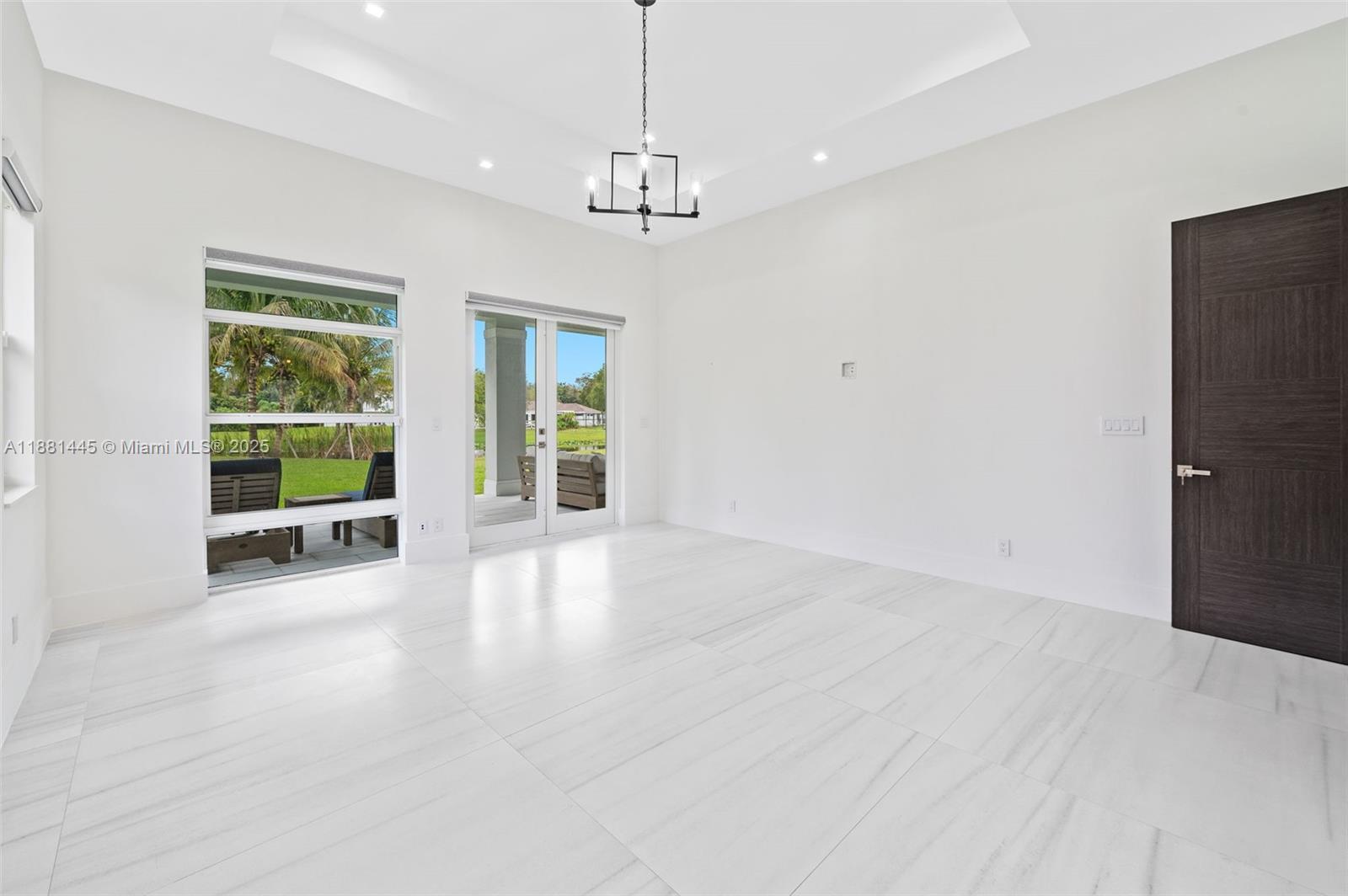 2400 Southwest 112th Avenue Davie, FL 33325 - Photo 27 of 61 a view of an empty room with a window