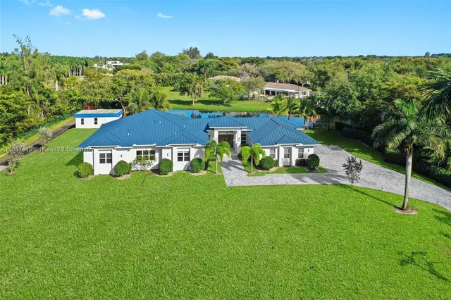 an aerial view of a house with garden