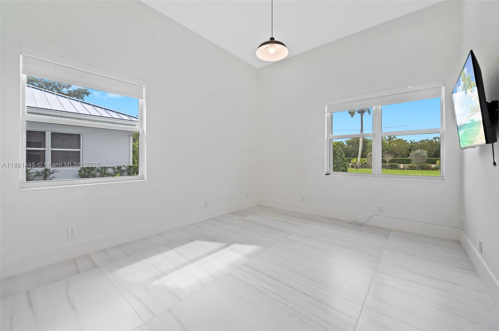 2400 Southwest 112th Avenue Davie, FL 33325 - Photo 38 of 61 an empty room with a window