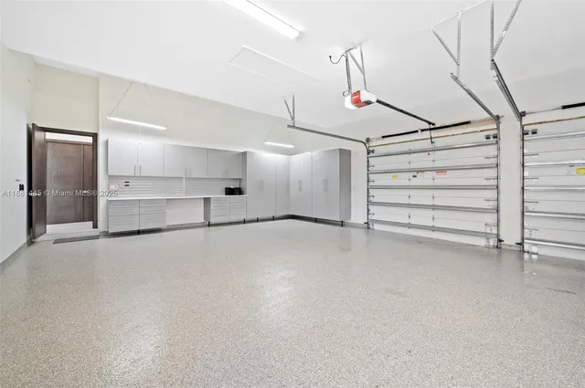 a front view of house with a garden