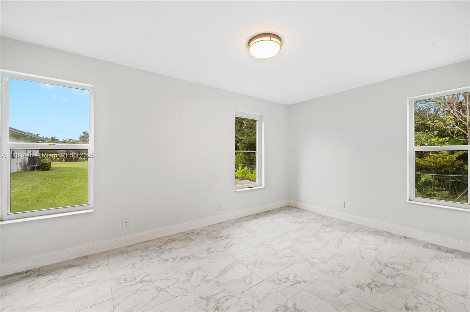 2400 Southwest 112th Avenue Davie, FL 33325 - Photo 57 of 61 an empty room with windows