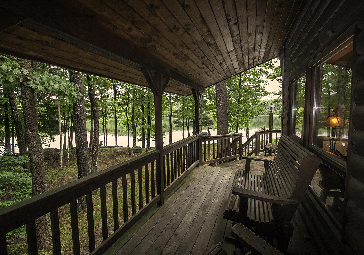 1469 Kennebec River Road Concord Township, ME 04920 - Photo 18 of 46 Mendoza_side_porch_bk_to_frt_hi-res