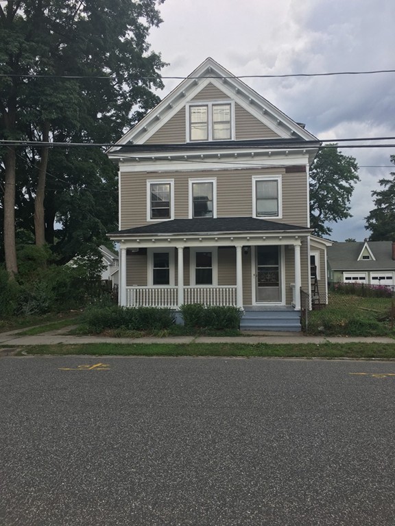 14 Farnsworth Street Springfield, MA 01107 - Photo 1 of 1 a front view of a house with a yard