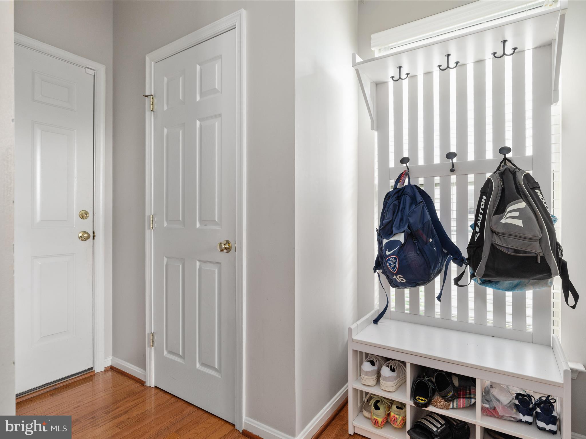 8705 Lords View Loop Gainesville, VA 20155 - Photo 14 of 58 a view of an entryway with wooden floor