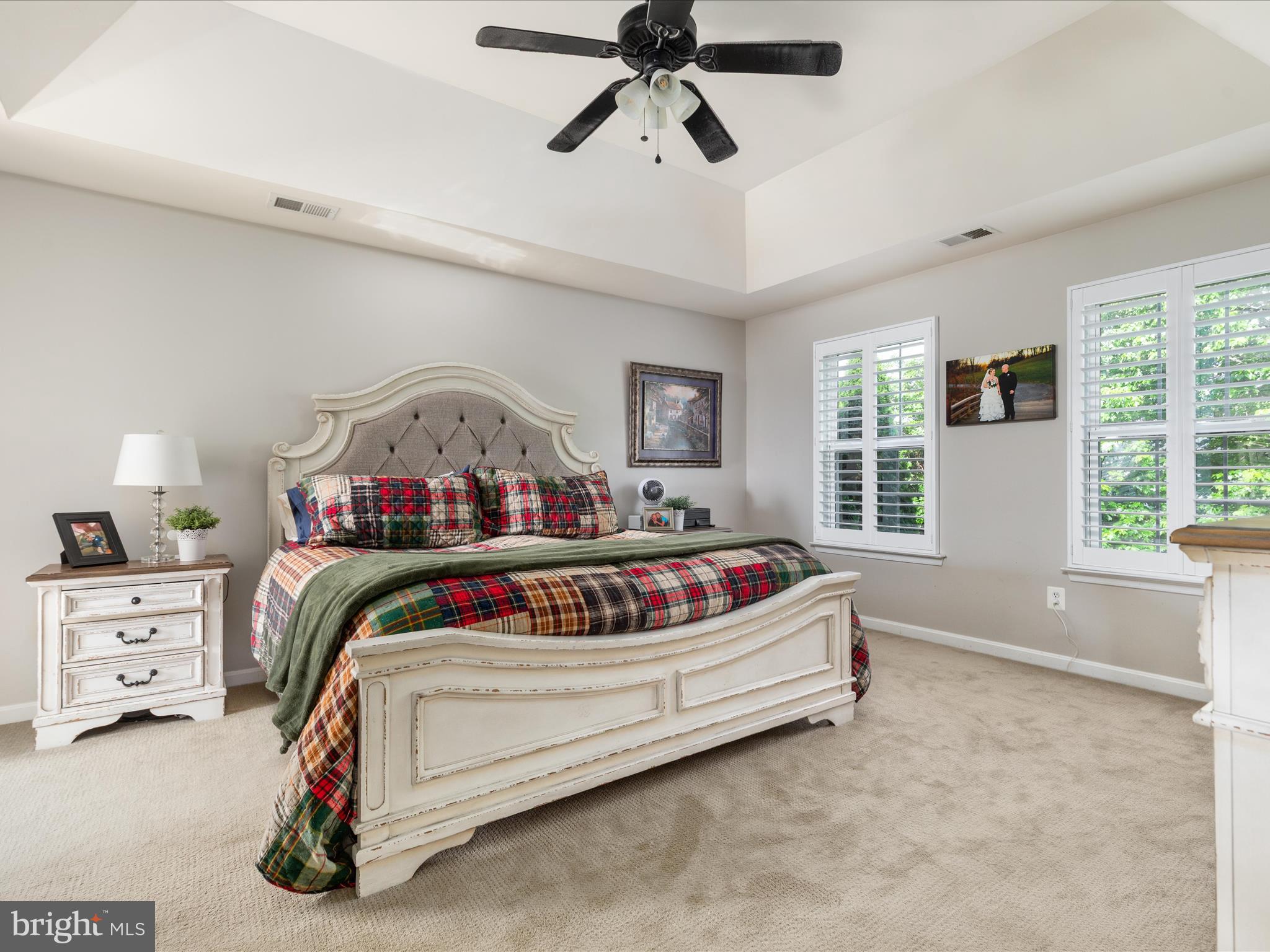 8705 Lords View Loop Gainesville, VA 20155 - Photo 18 of 58 a bedroom with a bed and a window
