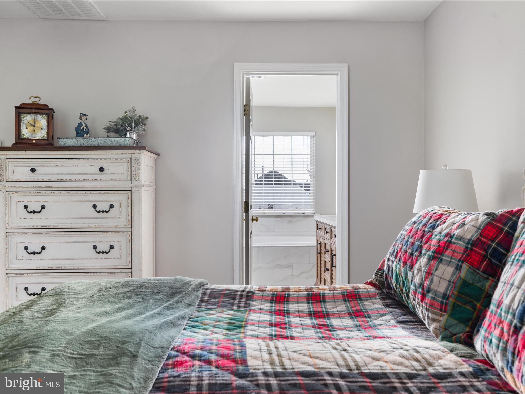8705 Lords View Loop Gainesville, VA 20155 - Photo 20 of 58 a bedroom with a bed and closet