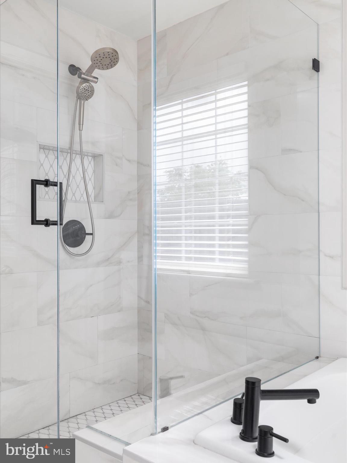 8705 Lords View Loop Gainesville, VA 20155 - Photo 22 of 58 a bathroom with a shower