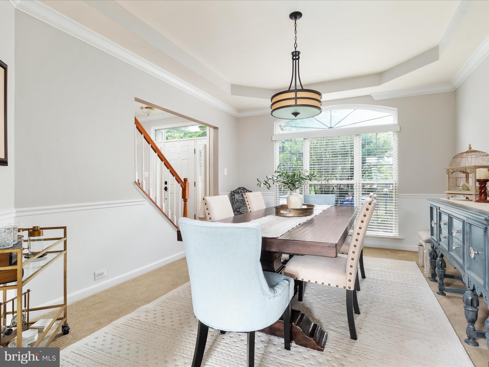 8705 Lords View Loop Gainesville, VA 20155 - Photo 3 of 58 a view of a dining room with furniture window and outside view