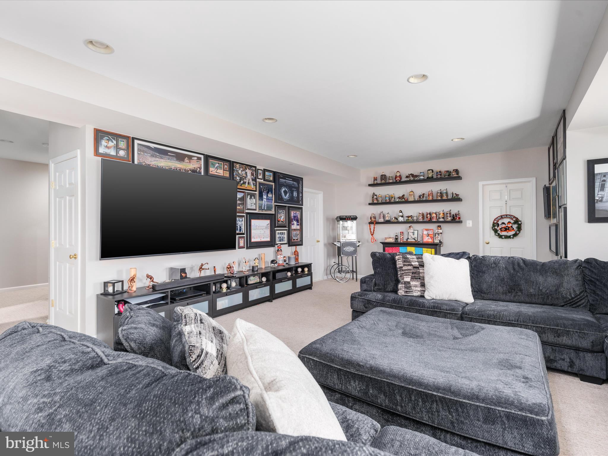 8705 Lords View Loop Gainesville, VA 20155 - Photo 31 of 58 a living room with furniture and a flat screen tv