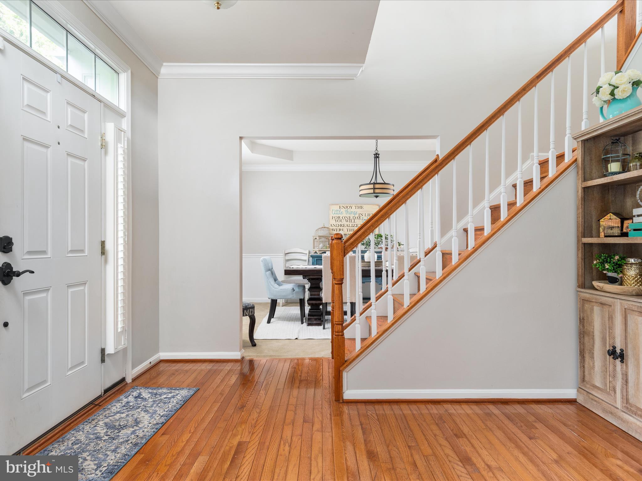 8705 Lords View Loop Gainesville, VA 20155 - Photo 4 of 58 a view of entryway with wooden floor