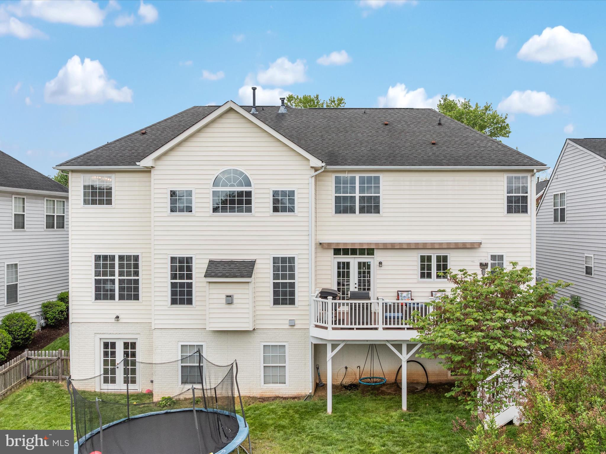 8705 Lords View Loop Gainesville, VA 20155 - Photo 43 of 58 a front view of a house with a yard