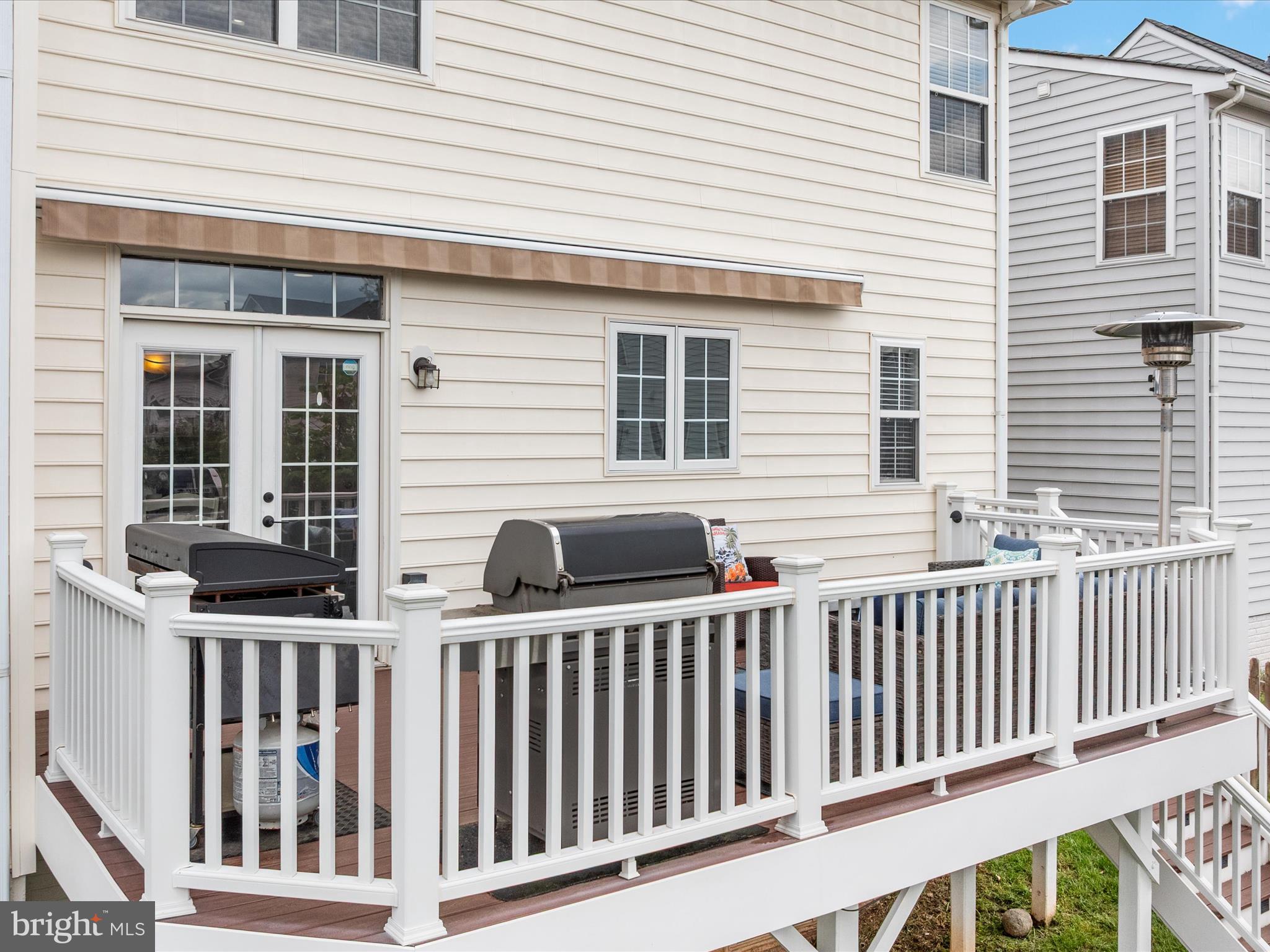 8705 Lords View Loop Gainesville, VA 20155 - Photo 44 of 58 a view of a house with wooden fence