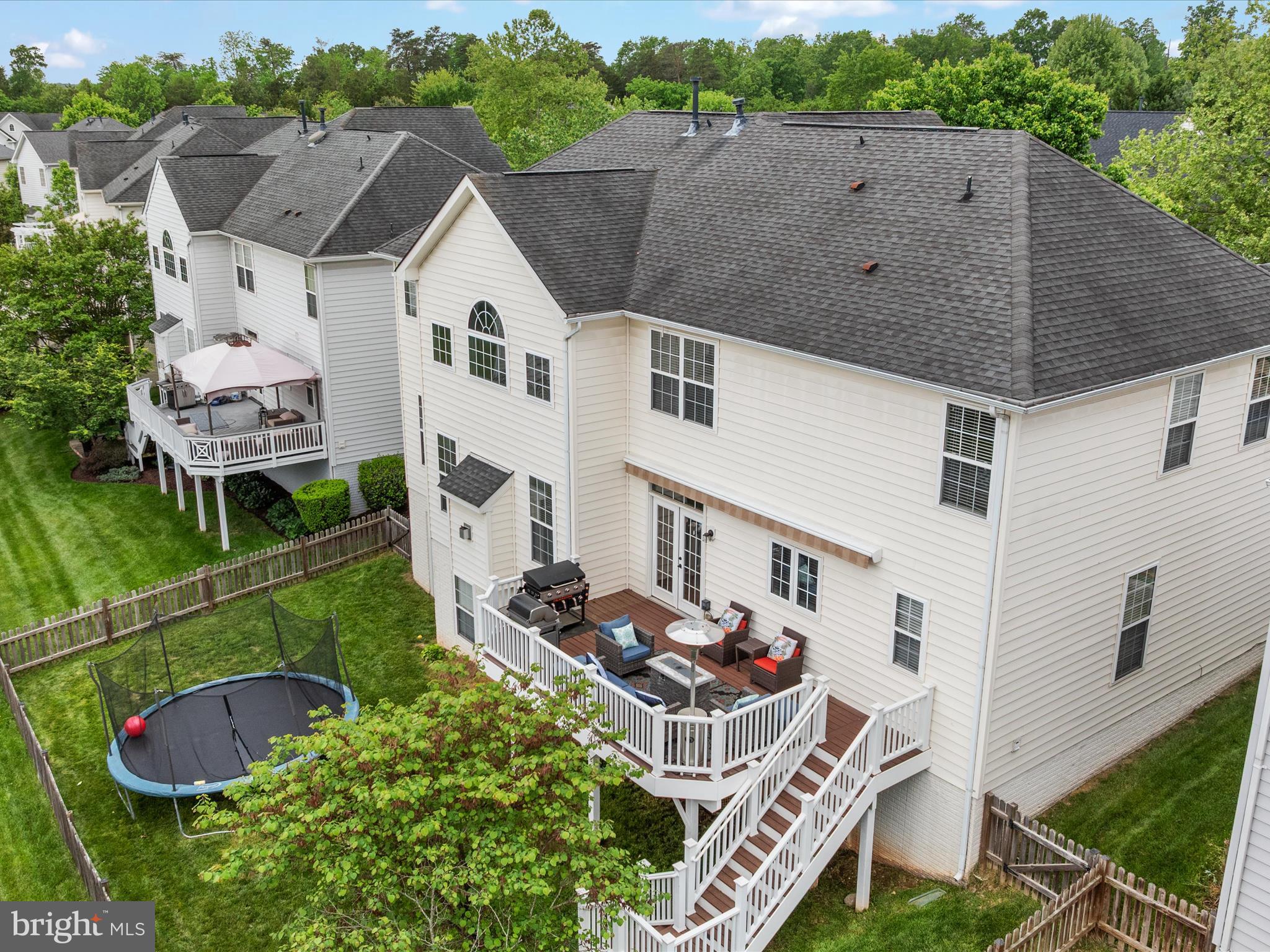 8705 Lords View Loop Gainesville, VA 20155 - Photo 45 of 58 an aerial view of a house with a yard