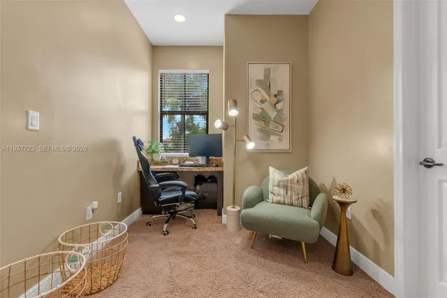 a work room with furniture and windows