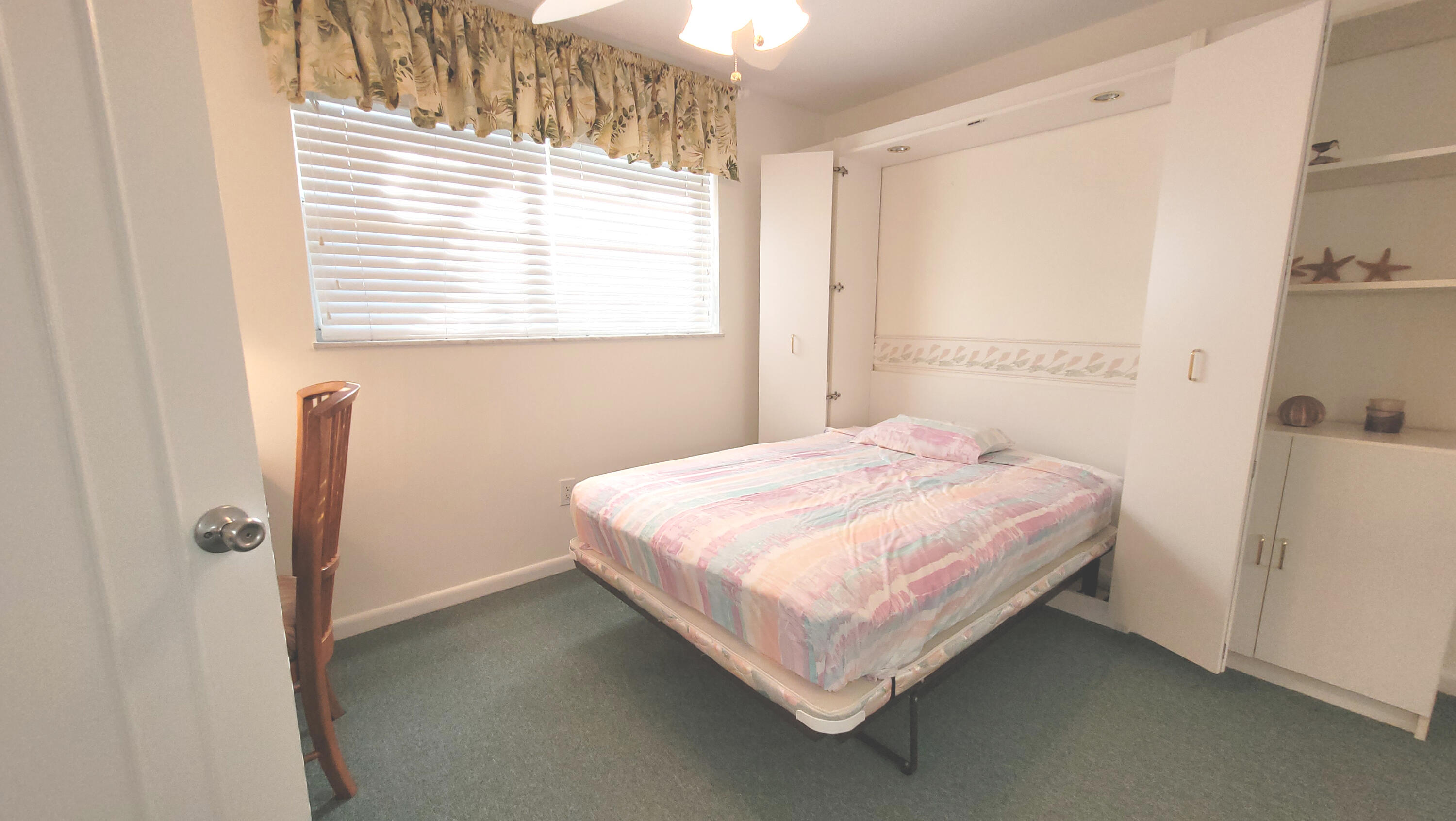 1941 Southwest Palm City Road, Unit 21B Stuart, FL 34994 - Photo 9 of 22 2nd Bedroom Murphy bed
