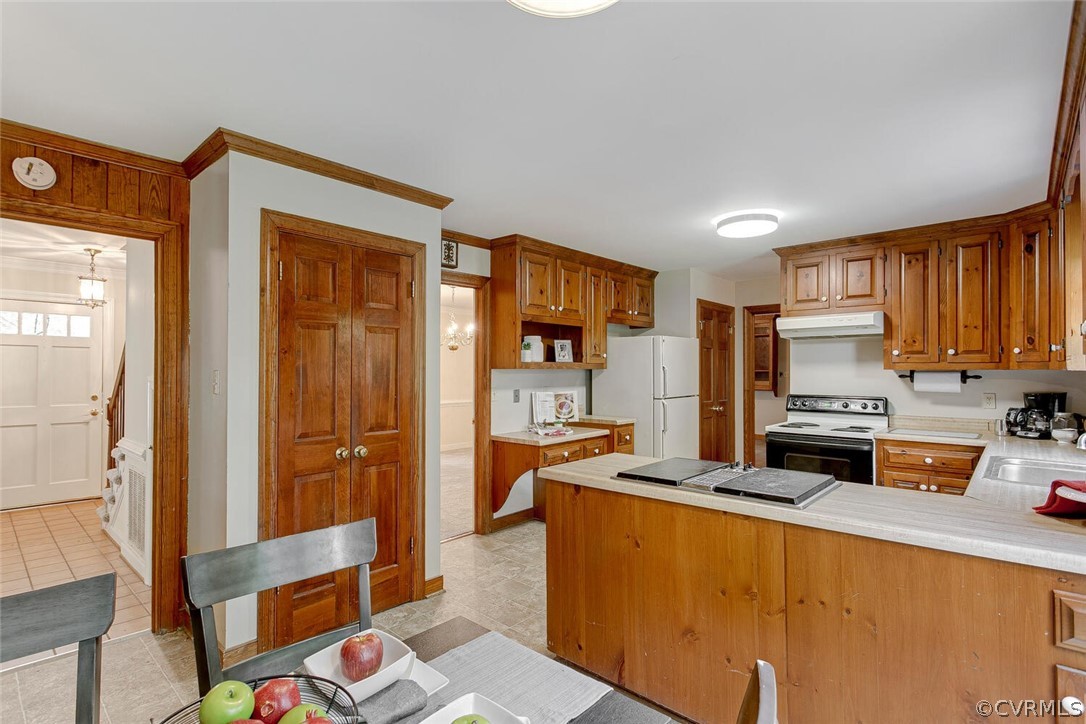 3414 Walkers Ferry Road Midlothian, VA 23112 - Photo 13 of 34 a kitchen with stainless steel appliances granite countertop a refrigerator stove and sink