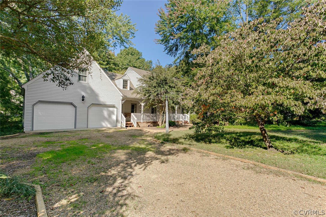 3414 Walkers Ferry Road Midlothian, VA 23112 - Photo 2 of 34 a front view of a house with garden