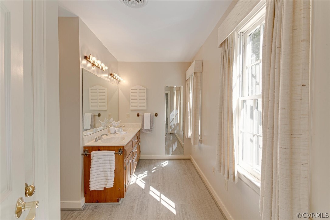 3414 Walkers Ferry Road Midlothian, VA 23112 - Photo 23 of 34 a view of a bathroom with shower and mirror