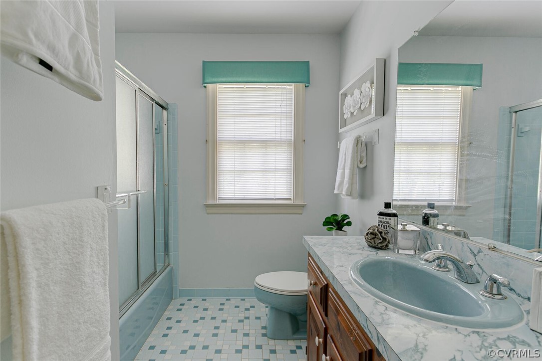 3414 Walkers Ferry Road Midlothian, VA 23112 - Photo 25 of 34 a bathroom with a sink toilet and shower