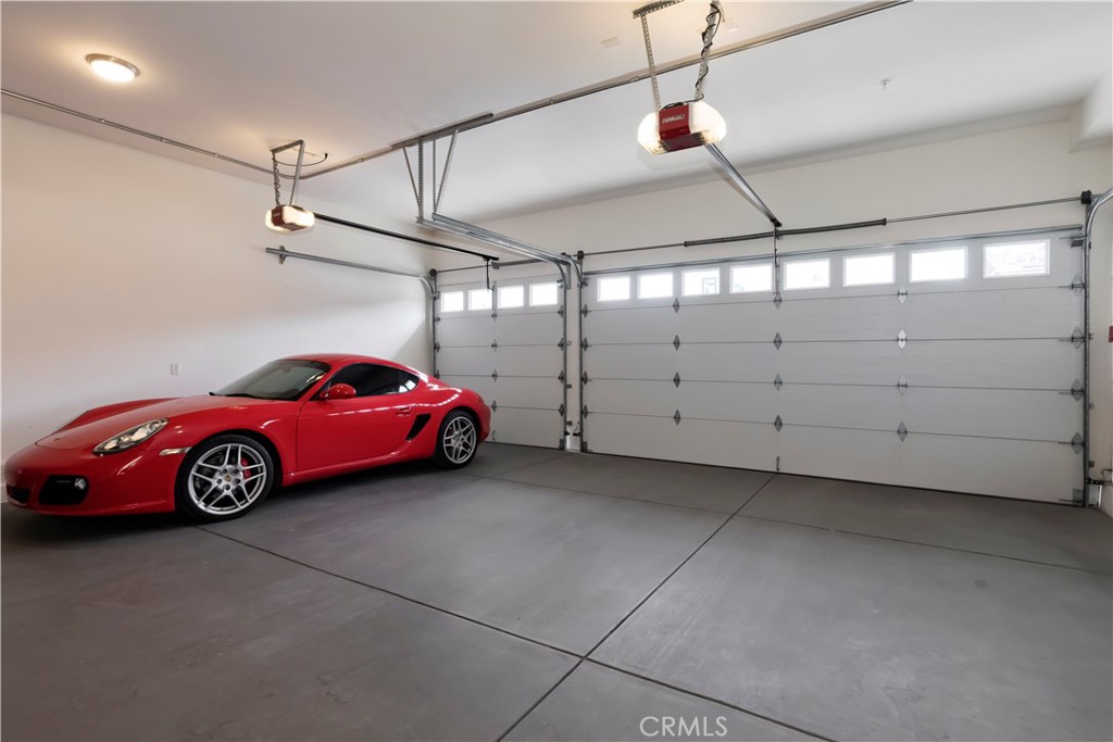 48 57th Place Long Beach, CA 90803 - Photo 40 of 47 a view of a garage and car parked