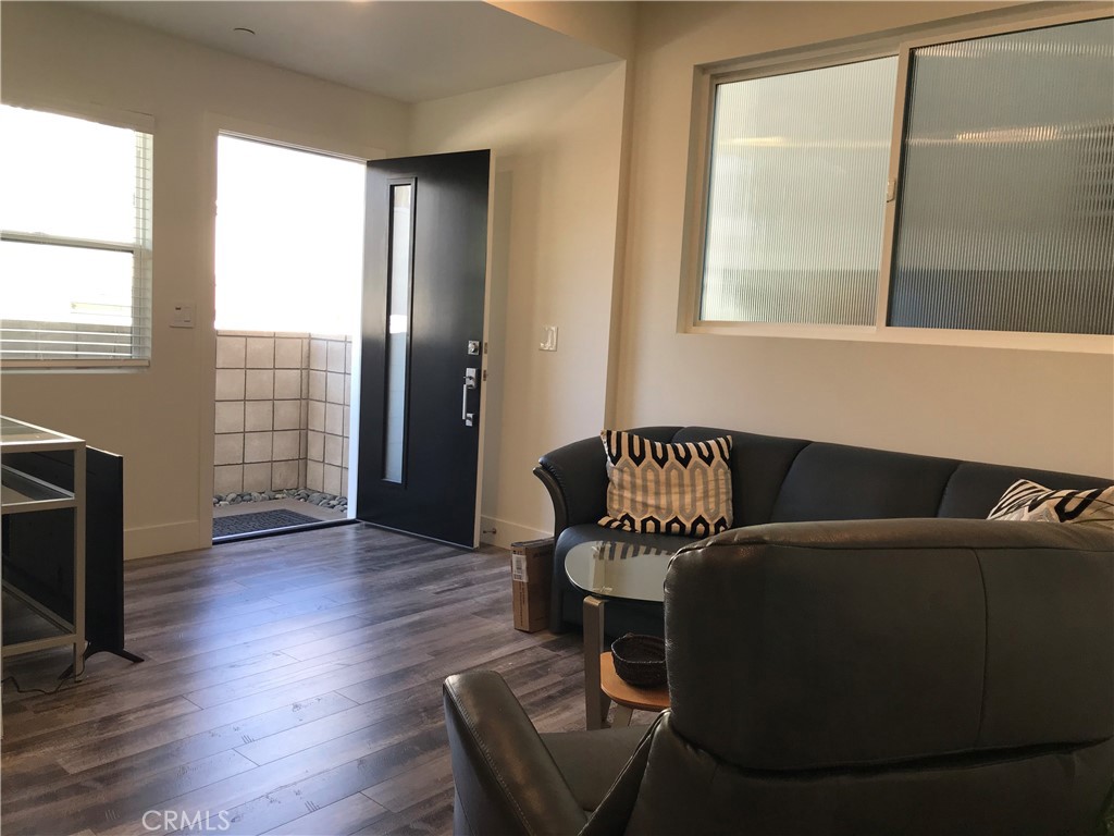 48 57th Place Long Beach, CA 90803 - Photo 41 of 47 a living room with furniture and a wooden floor