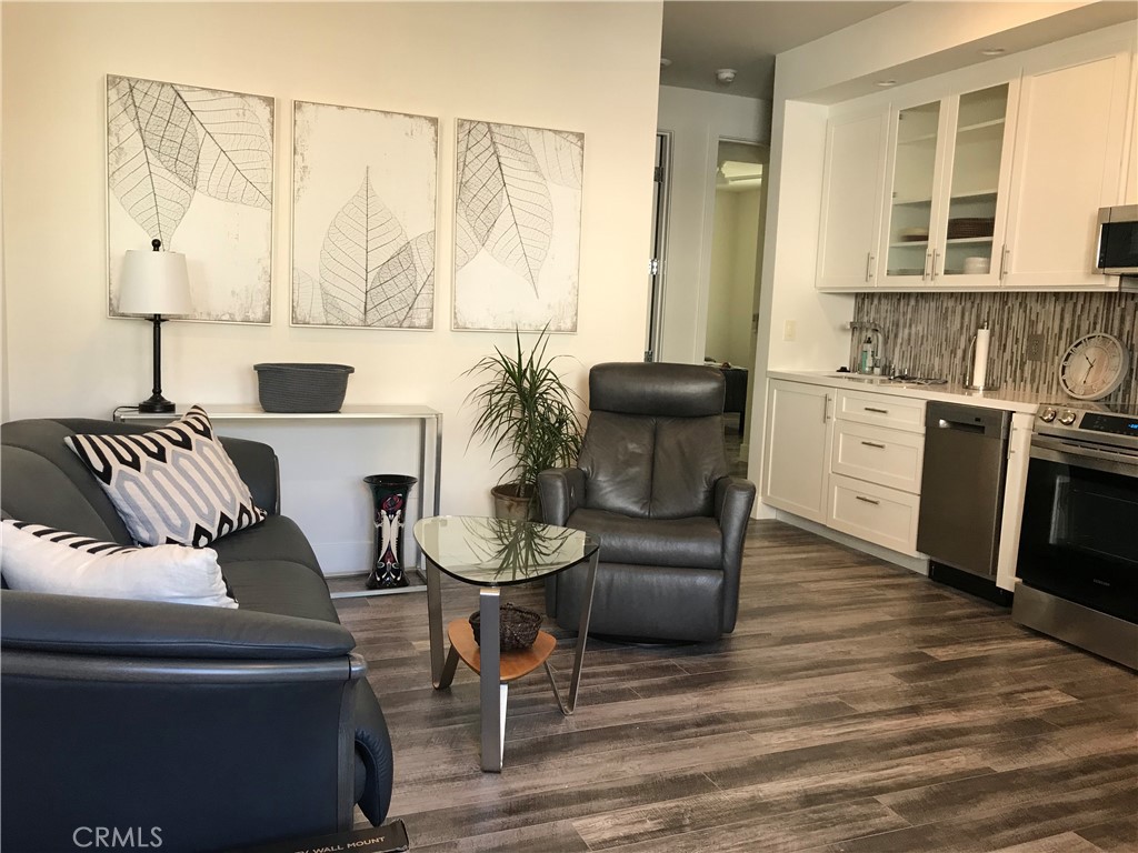 48 57th Place Long Beach, CA 90803 - Photo 42 of 47 a living room with furniture and a fireplace