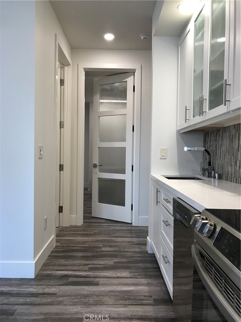 48 57th Place Long Beach, CA 90803 - Photo 44 of 47 a bathroom with a sink and a mirror