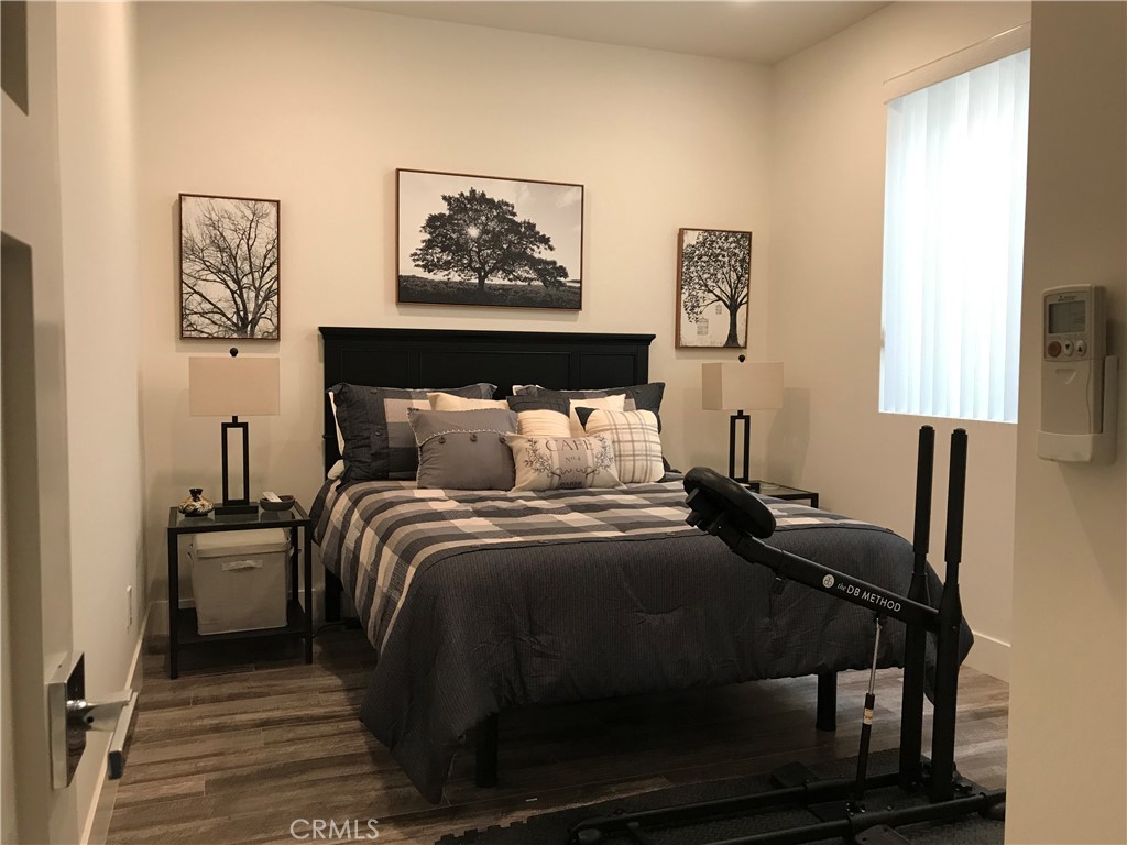 48 57th Place Long Beach, CA 90803 - Photo 45 of 47 a bedroom with a bed and glass windows