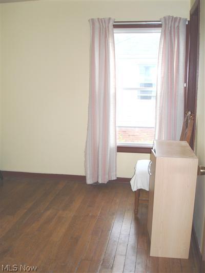 25515 Tungsten Road Euclid, OH 44132 - Photo 14 of 19 2nd bedroom upstairs has new paint, windows and hardwood floor