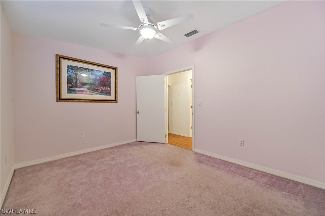 20100 Haskins Road North Fort Myers, FL 33917 - Photo 27 of 35 an empty room with a fan & a window