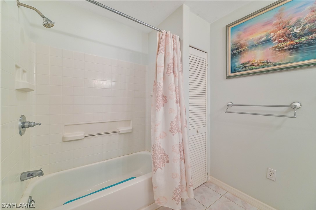 20100 Haskins Road North Fort Myers, FL 33917 - Photo 29 of 35 a bathroom with a shower and a glass door