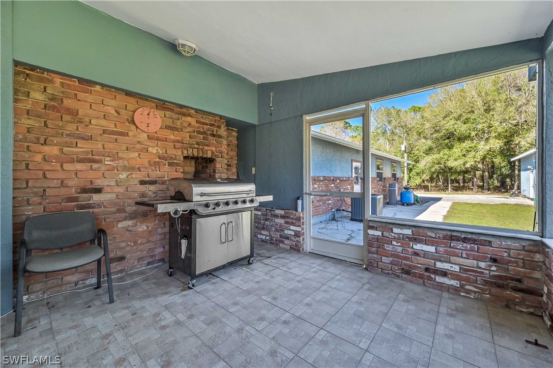 20100 Haskins Road North Fort Myers, FL 33917 - Photo 34 of 35 a room with storage and utility