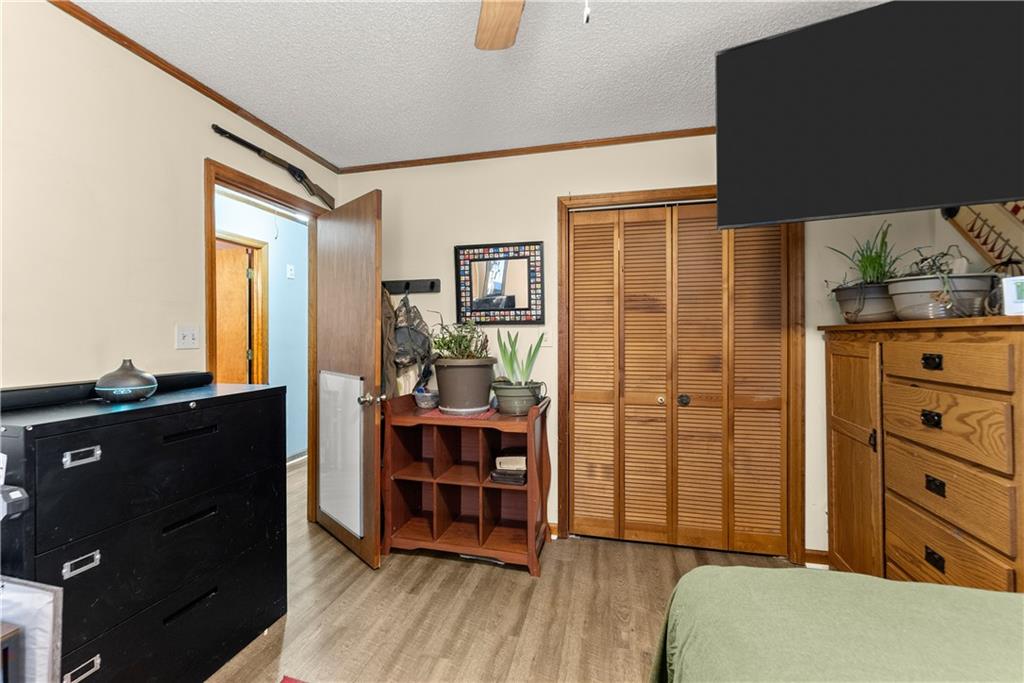 1527 Gold Mine Road Dawsonville, GA 30534 - Photo 21 of 39 a living room with furniture and wooden floor