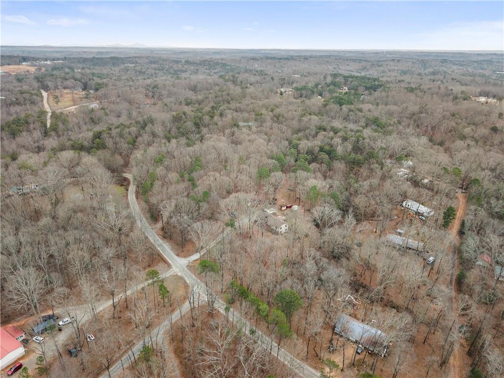 1527 Gold Mine Road Dawsonville, GA 30534 - Photo 36 of 39 a view of a city with lush green forest
