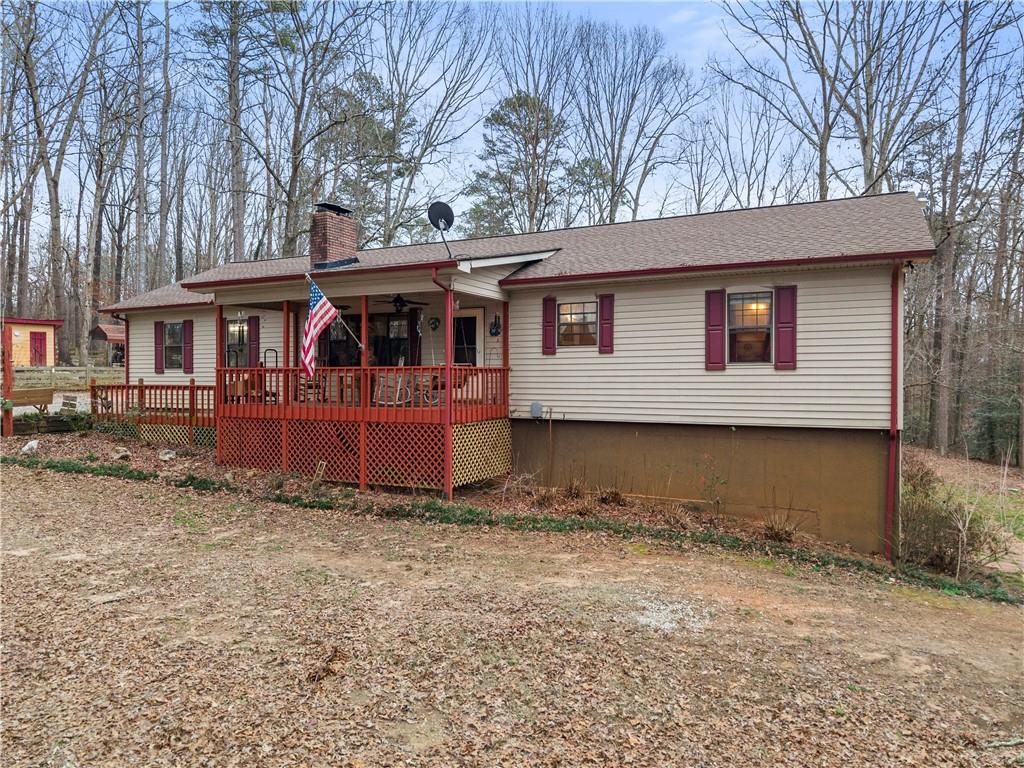 1527 Gold Mine Road Dawsonville, GA 30534 - Photo 4 of 39 a view of a house with a yard