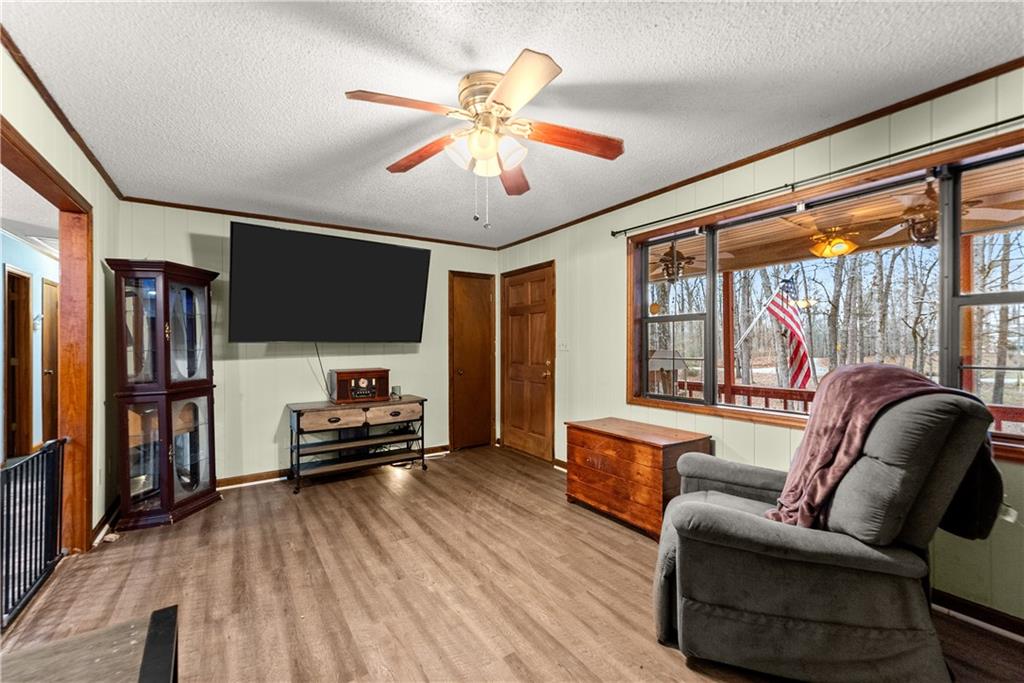 1527 Gold Mine Road Dawsonville, GA 30534 - Photo 8 of 39 a living room with furniture and a flat screen tv
