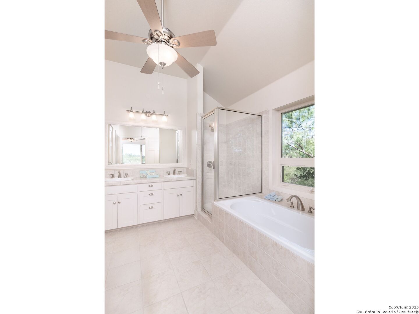 800 Steapp Lane Mason, TX 76856 - Photo 17 of 47 a bathroom with a tub a sink and a large mirror