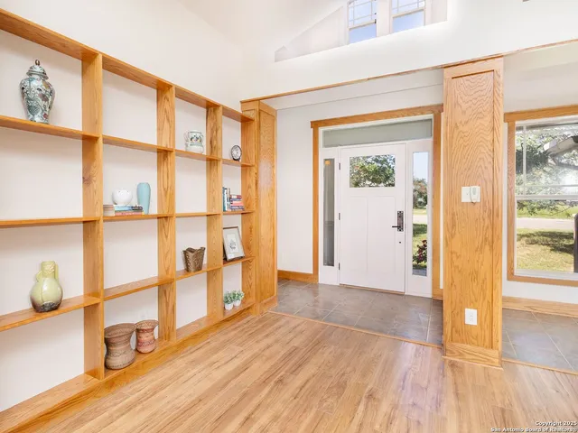 a view of livingroom with furniture wooden floor and window