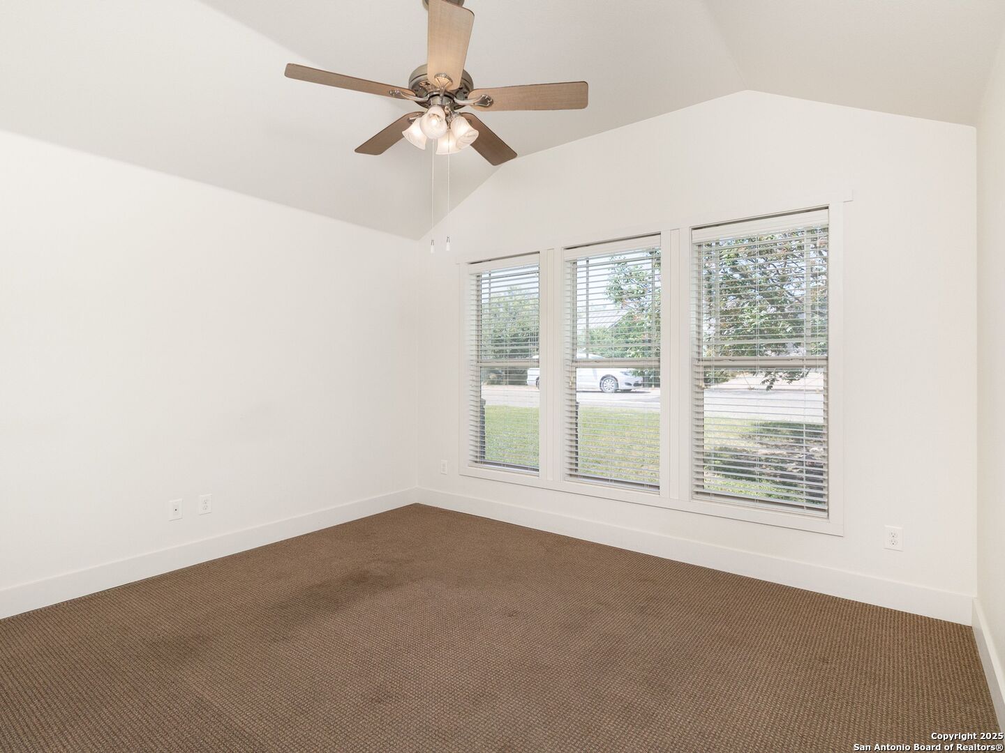 800 Steapp Lane Mason, TX 76856 - Photo 35 of 47 an empty room with windows and fan