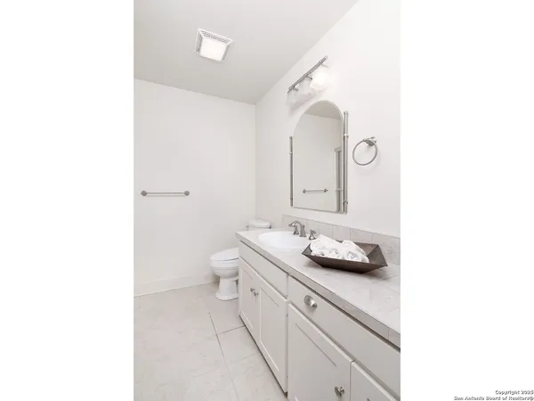 a view of balcony with wooden floor