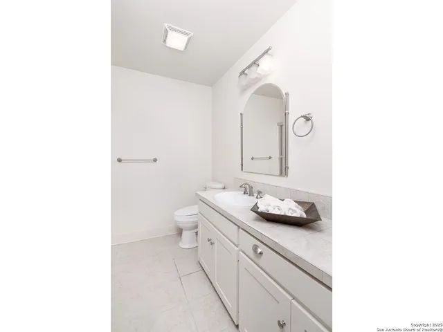 a view of balcony with wooden floor