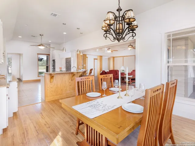 a view of a dining room with furniture