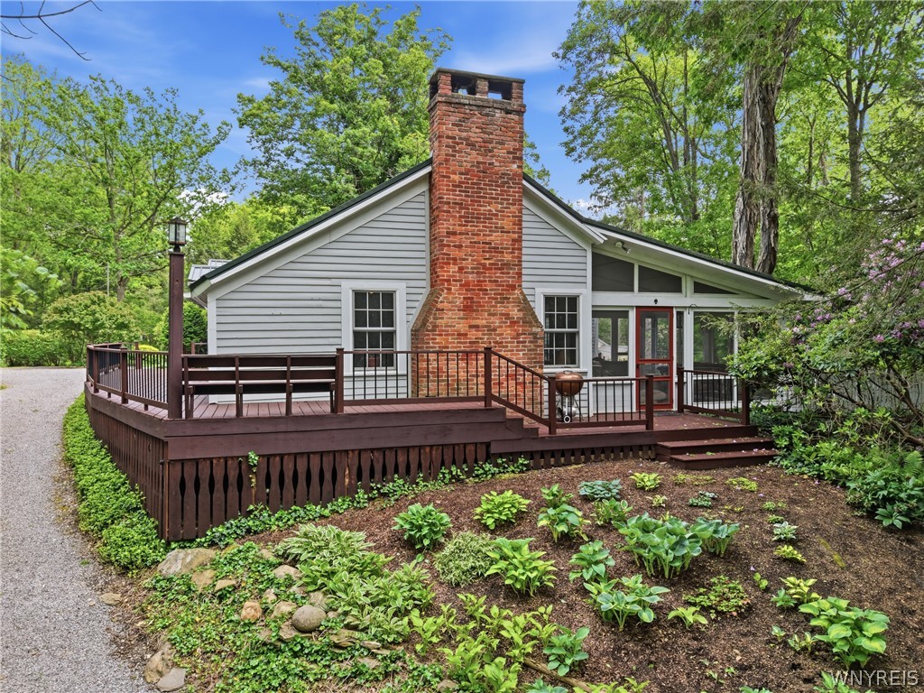 9665 New Oregon Road Eden, NY 14057 - Photo 4 of 48 side of house with continued decking attached to s