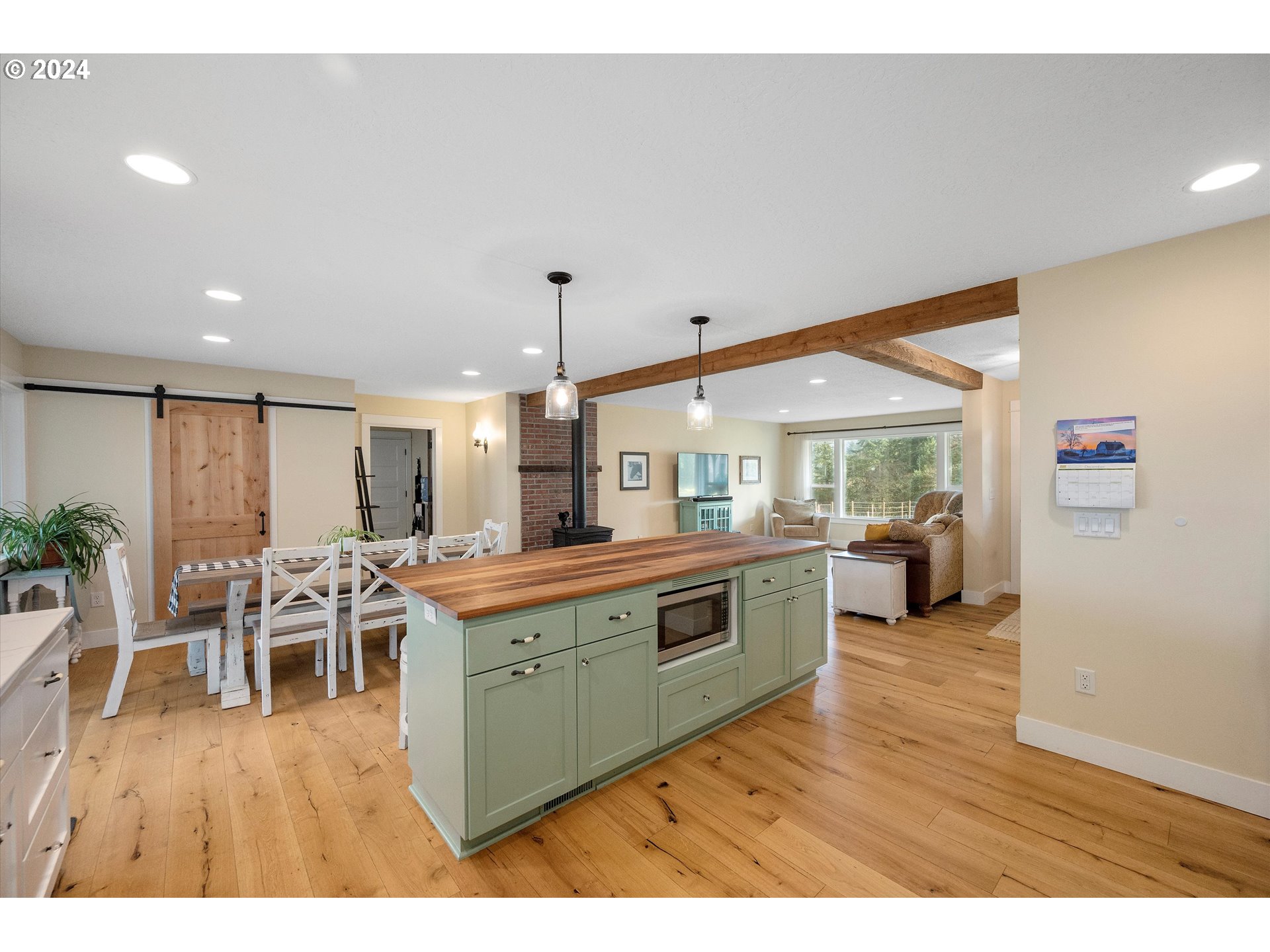 7625 Southeast Seawood Road Amity, OR 97101 - Photo 12 of 48 a kitchen with a table and chairs
