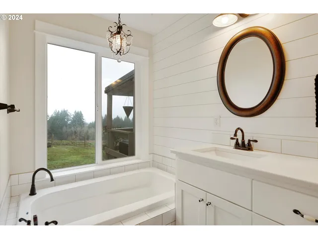 a bathroom with a sink and a bathtub