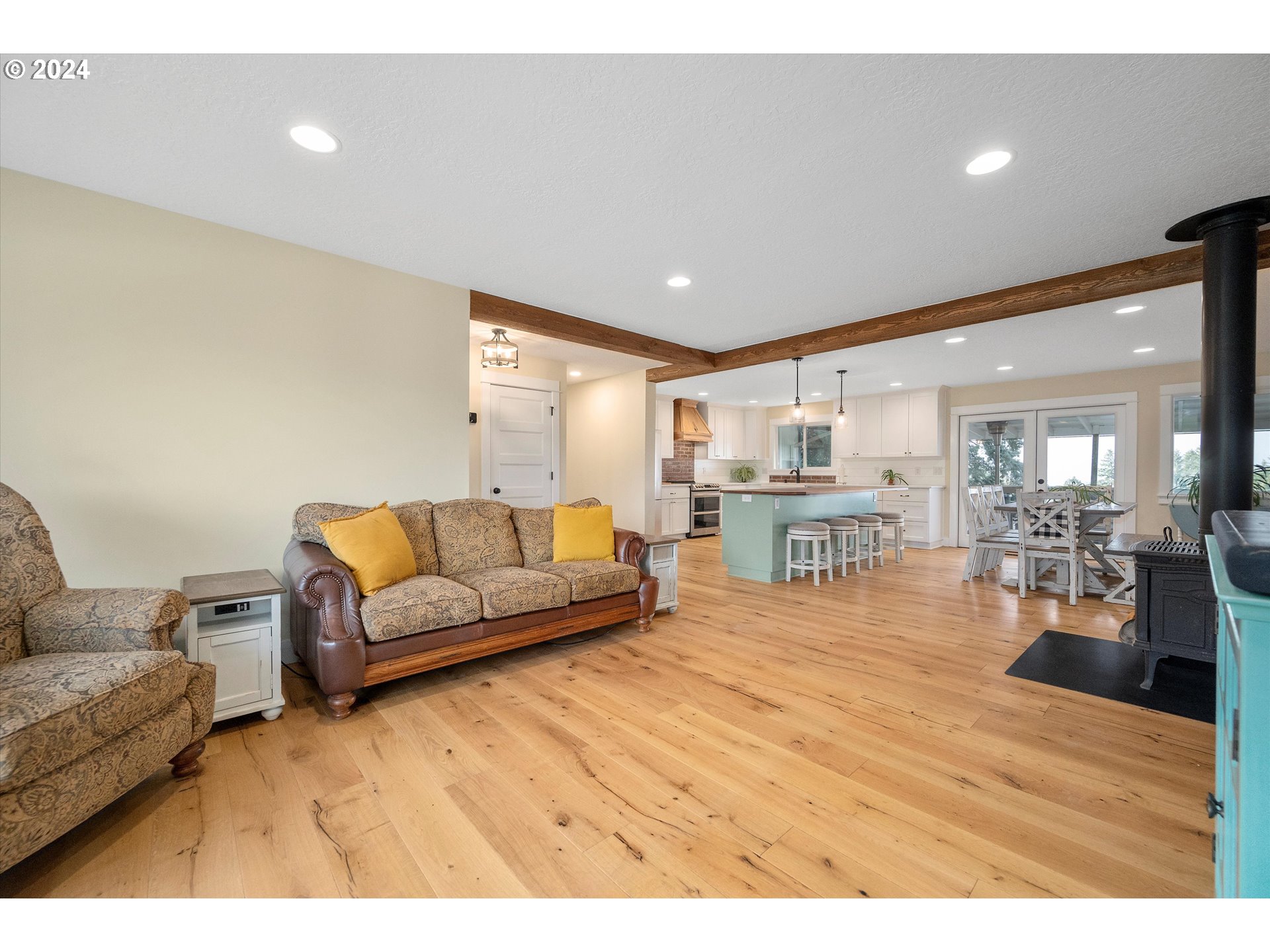 7625 Southeast Seawood Road Amity, OR 97101 - Photo 7 of 48 a living room with furniture and view of kitchen