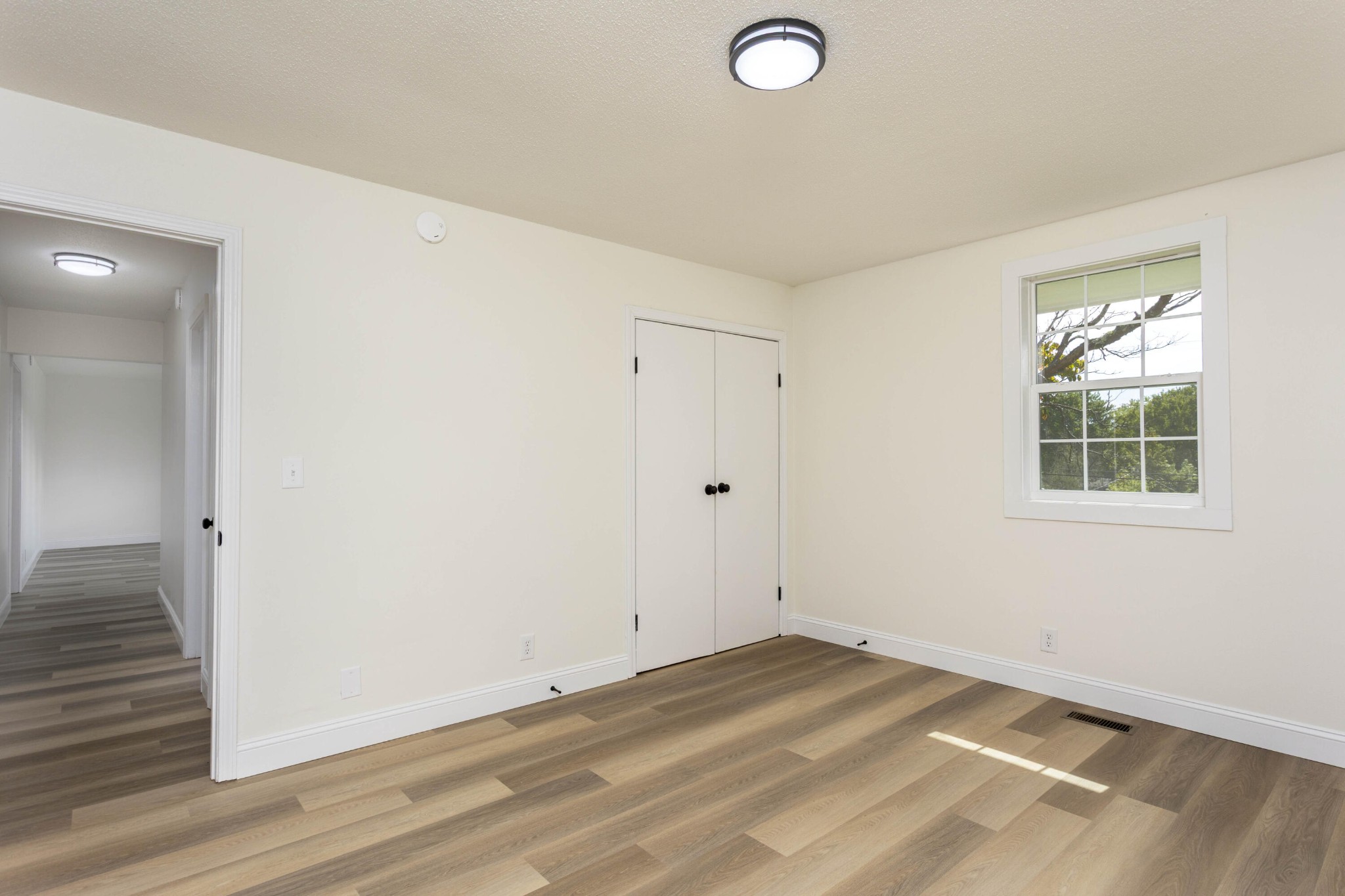 132 Walnut Street Spring City, TN 37381 - Photo 19 of 26 an empty room with a window