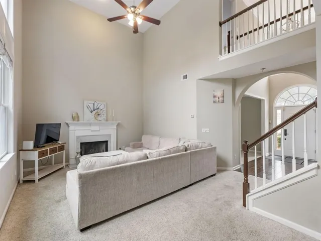 a kitchen with a stove a sink and a refrigerator