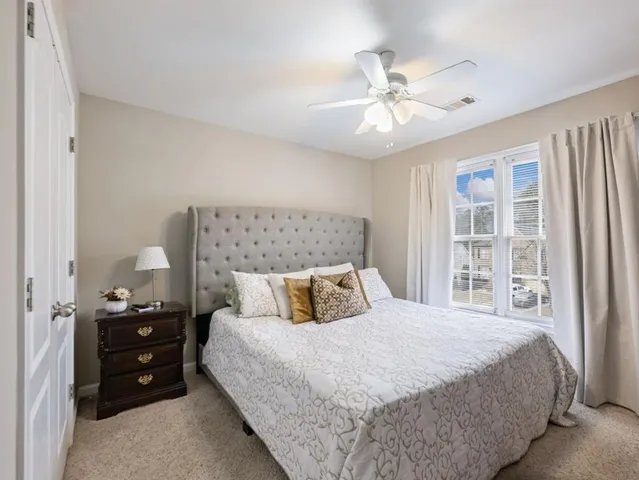 a view of balcony with wooden floor and lake view