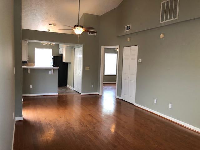 Wood floors and coat closet are great for entertaining.